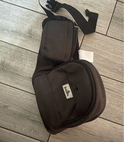 Baby carrier / adjustable back support