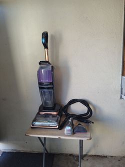 bisell Revolution hydrosteam carpet washer.