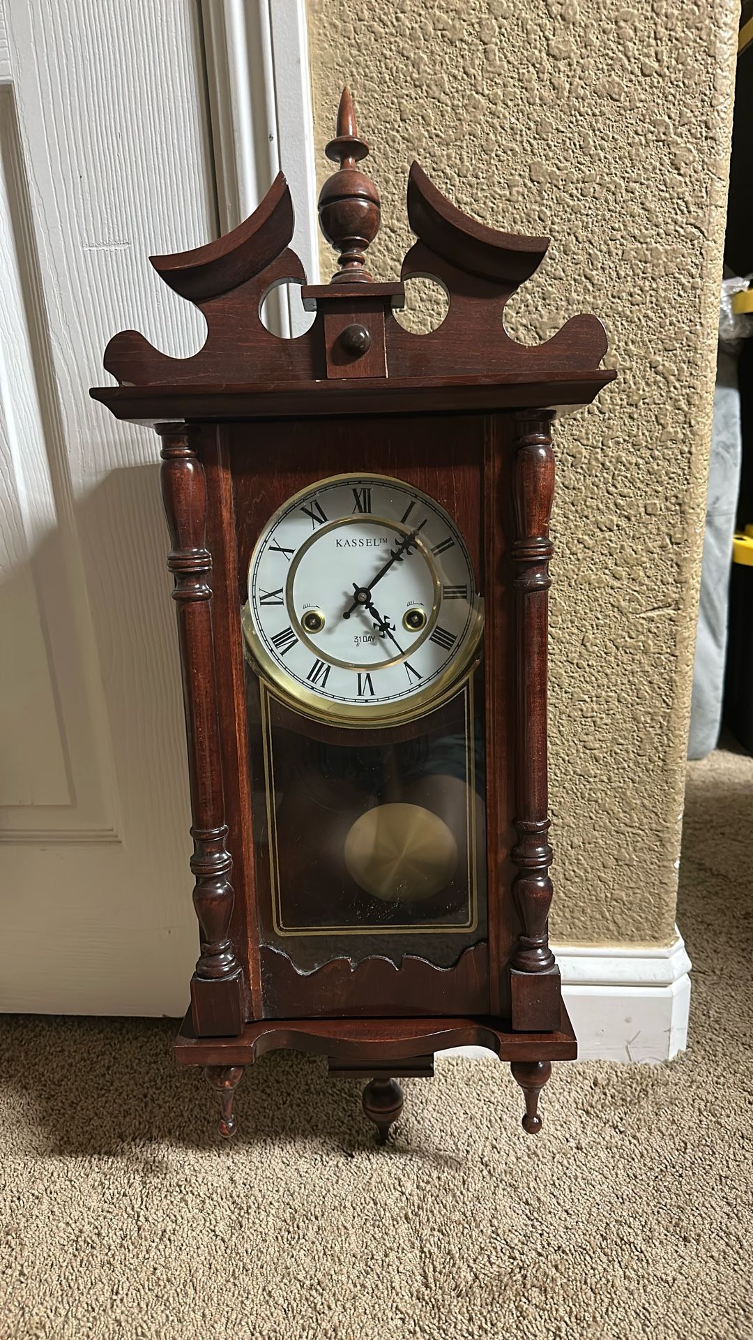 Kassel 31-day wind-up wall clock with a pendulum