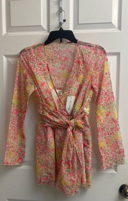 Brand new Juniors floral romper size 4