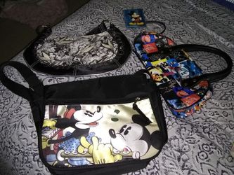 3 Disney handbags. Two small and one medium.