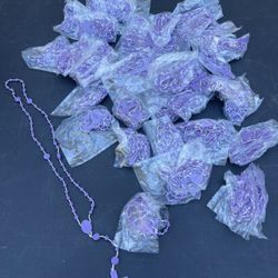 brand new purple rosary’s . 23 in total… 1$ each or all for 20$ individual packs