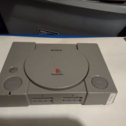 PlayStation PSOne system- Complete w/2 original controllers, games