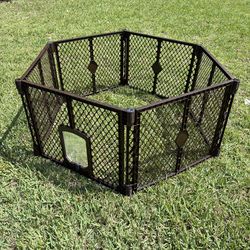 Folding pet enclosure
