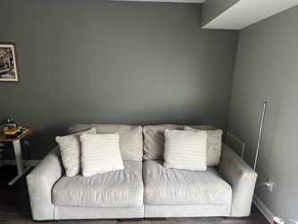Ashley’s Wide comfortable couch and sleeps an adult easily