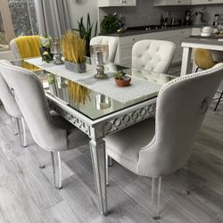Charlotte dining chair with acrylic legs