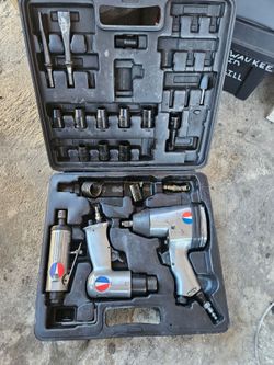 DeVilbiss Air Tool Kit, which typically includes a pneumatic impact wrench, ratchet, and air hammer.