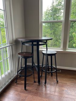 Round Bar Height Table with Barstools