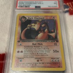 1st Ed Dark Charizard PSA 7 (Swirl)