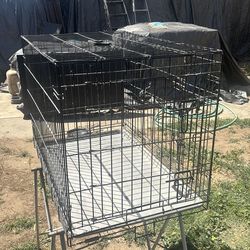 Pet cage with bottom tray 24 inche high by 22 wide by 35 3/4 long