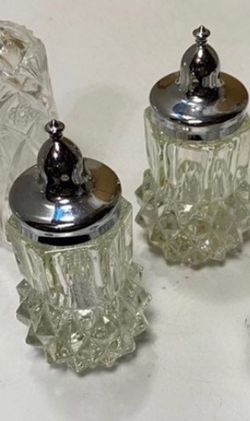 Set of Crystal Cut Diamond Salt & Pepper Shakers With Chrome Silver Plastic Lids.