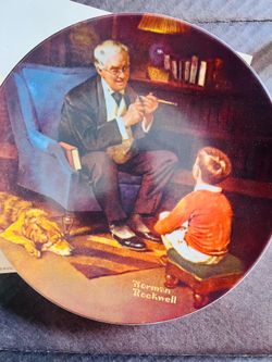 This is a vintage 1982 "The Tycoon" collector plate produced by Knowles Fine China, part of the Rockwell Heritage collection.The scene depicts a grand