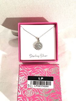 Brand new .925 silver pendant with CZ diamonds and silver necklace.