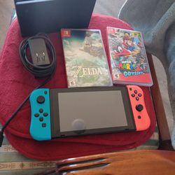 Nintendo Switch And TV Docking Box And 2 Games