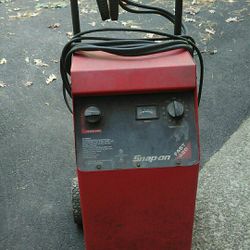 Snap-on battery charger