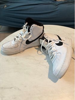 Black and white hightop air forces