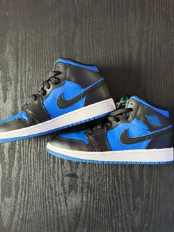 Air Jordan 1s Mid black royal blue