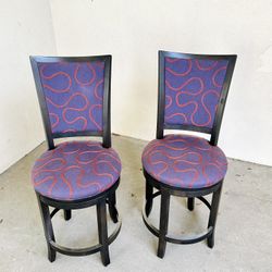 A Pair of Upholstered Counter Stools