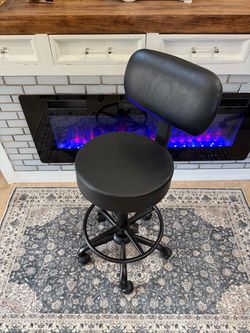 Black swivel rolling drafting stool with footring