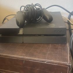 PS4 w/ Controller + Uncharted: The Nathan Drake Collection