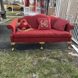 Vintage Chippendale-style camelback settee