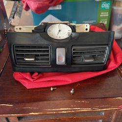 Infiniti I30 Center air vent / clock / hazard switch