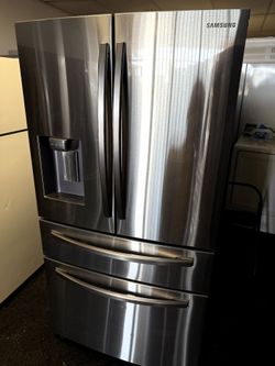 Full size Samsung stainless steel French door refrigerator and bottom freezer