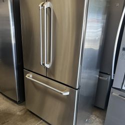 Fully Wrapped stainless steel GE Cafe™ Series 20.7 Cu.Ft. Counter-Depth Frenchdoor Water and icemaker inside can deliver  Retail price $3000