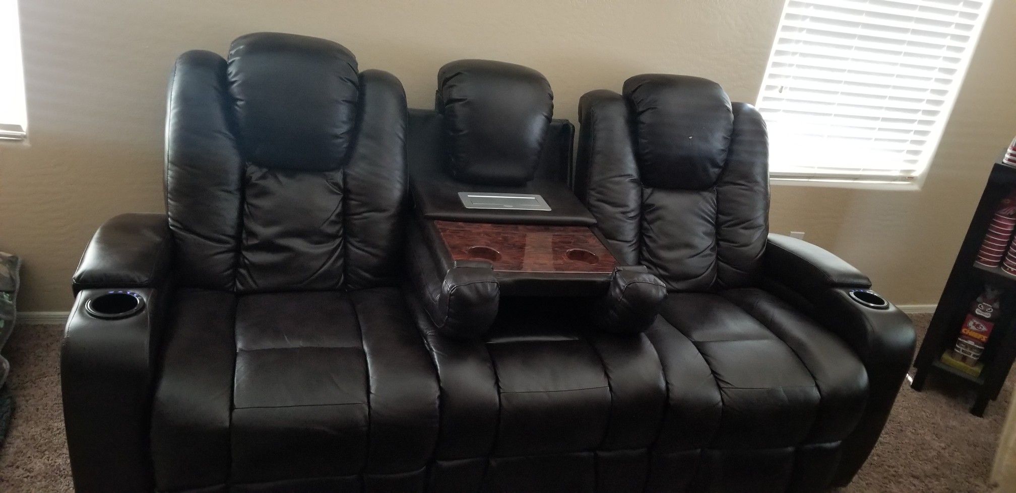 Black leather media couch