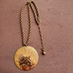 Copper medallion pendant. $7 reduce.