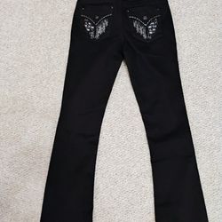 Miss Me Black- Out Jeans With Silver Stitching On Back, And Rhinestone Bling. Size 27 . Brand New With Tags . Angel Wing Butt Flaps On Back Pockets. 