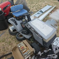 Older Model Craftsman Sit Down Mower.