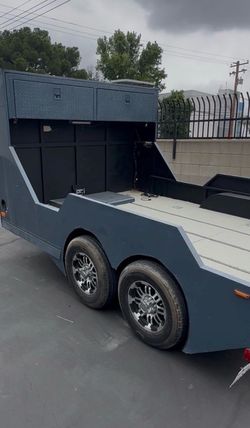 Toy hauler race track trailer