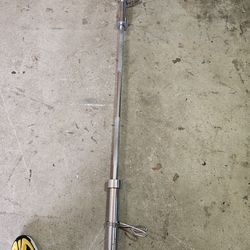 Solid 5 foot Olympic 2" weight bar with clips