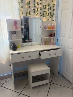 White vanity with chair