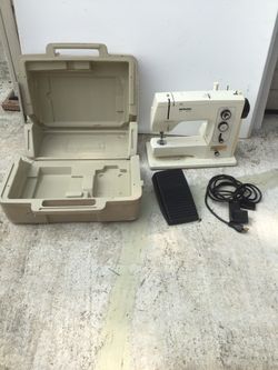 Bernina 801 sewing machine. Works missing the bobbin case. Need a good cleaning and possible adjustment from Storage