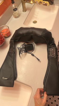 Black electric shoulder massager
