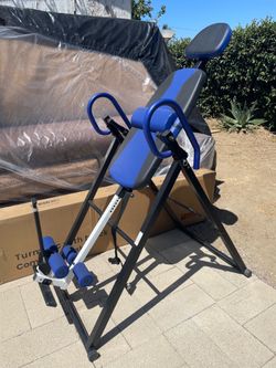 Inversion table for back pain relief/ Tabla inversa para dolor de espalda