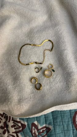 Gold braclet earrings and ring