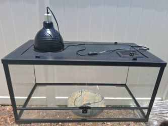 Reptile Tank with Heat Lamp.