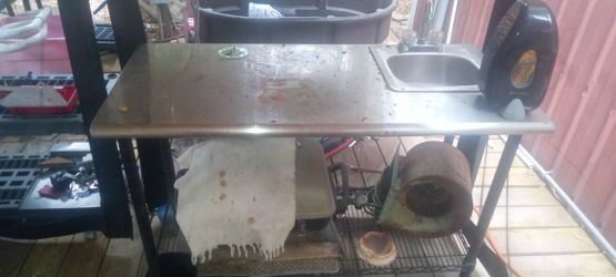 Stainless Table With Sink Mounted In It