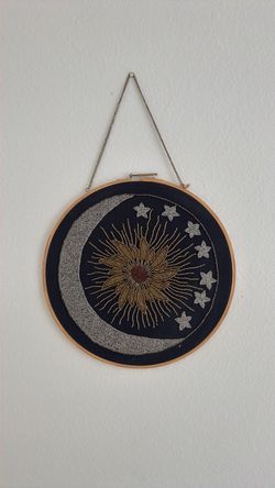 Beaded moon and sun decor