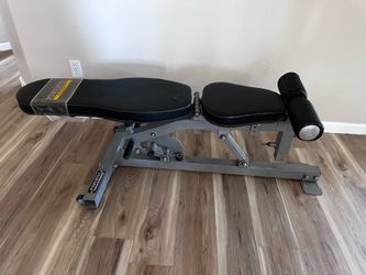 Powertec adjustable FID (Flat, Incline, Decline) workout bench.