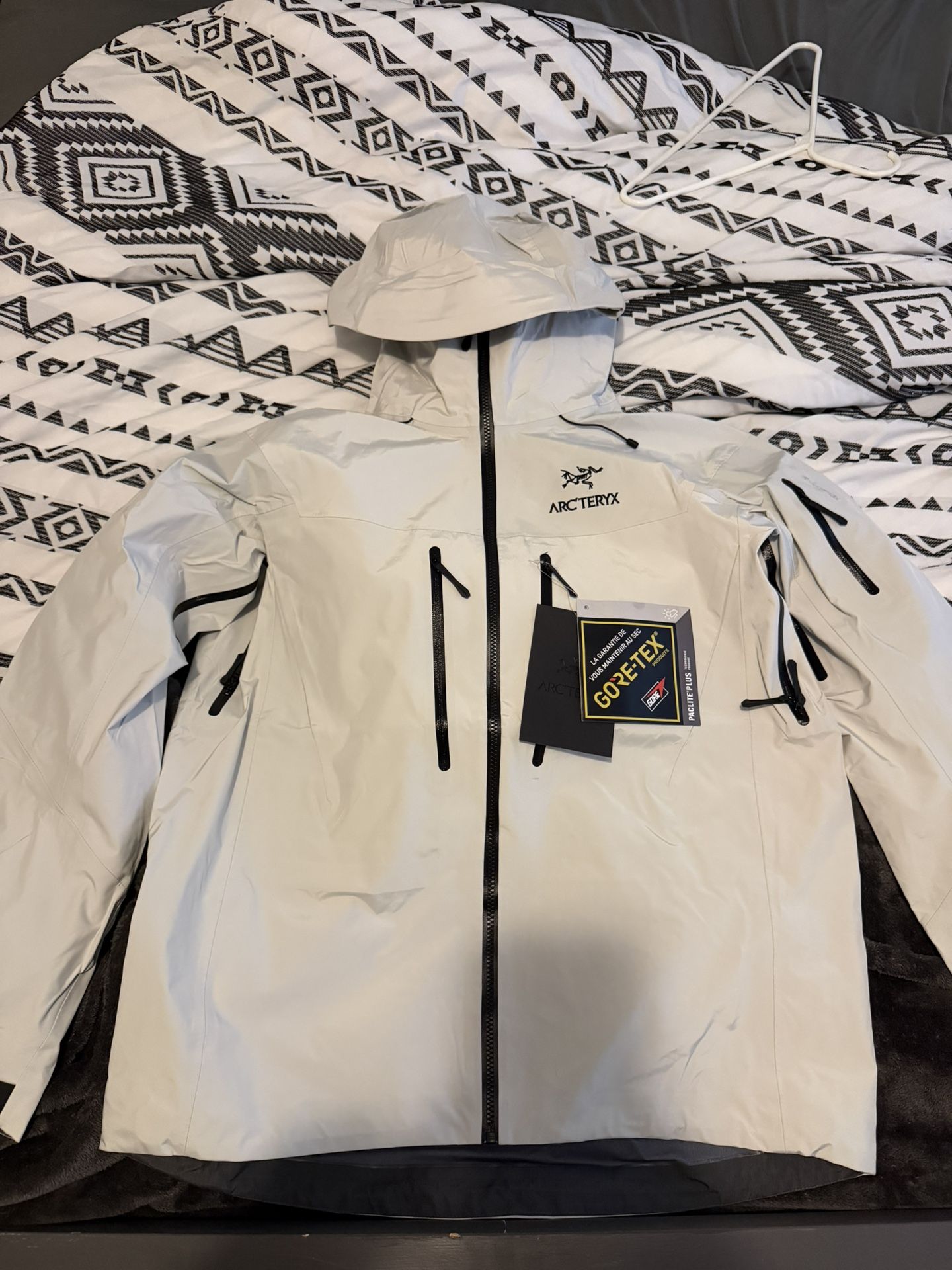 white arcteryx jacket