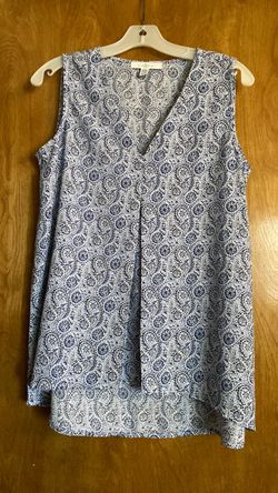 Small loose fitting sleeveless Blouse