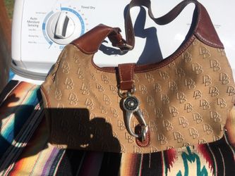 Original Dooney&Burke bag, lovely twin bed comforter/sham, wine holder barrel, and wall-mounted candal holder,