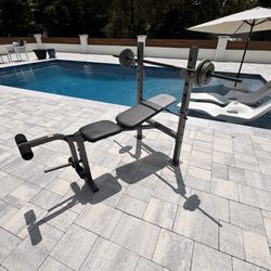 Gold’s Gym XR 6.1 Weight Bench + Barbell/Weights 