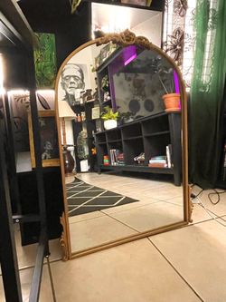 Arched wall mirror