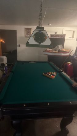 Pool table with Tiffany stile vintage light