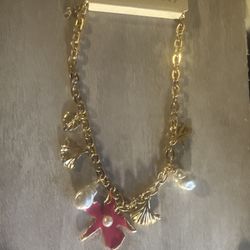 Necklace With A Pink Flower